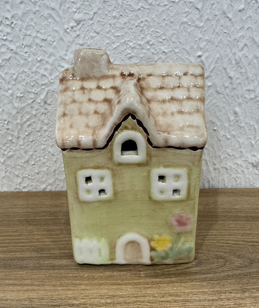 Yellow Rock Yellow House With Flowers